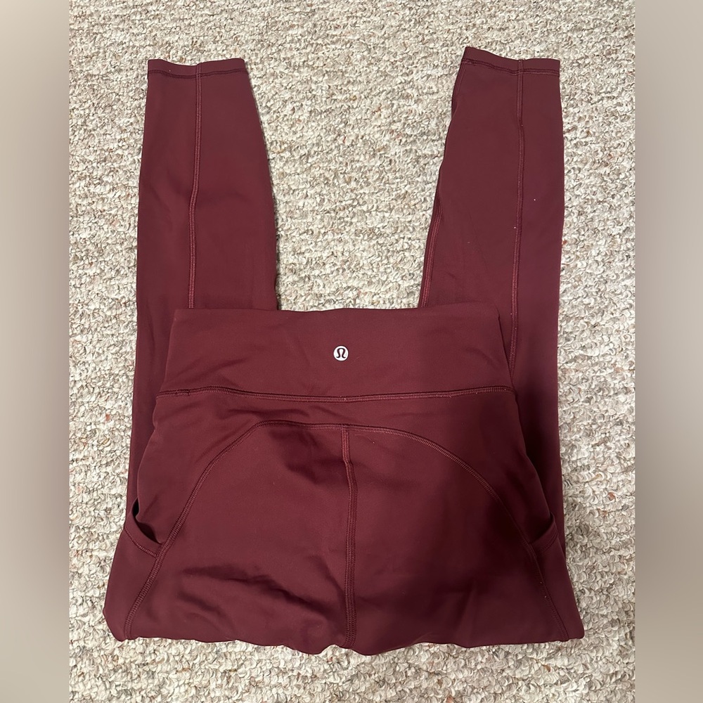 Lululemon burgundy invigorate leggings 25” - Picture 2 of 3